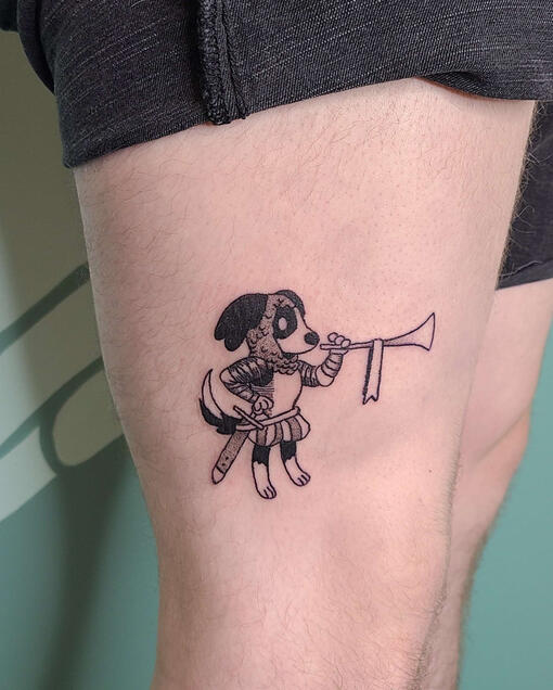 black and grey tattoo of a dog holding a horn, wearing knightly armor.